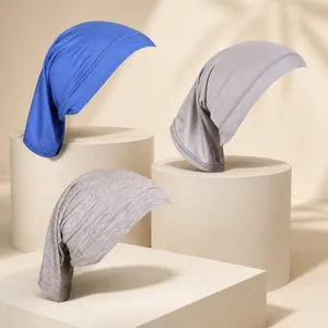 Set of Modal cotton hijabs in blue and grey showing elastic knit fabric and stitching