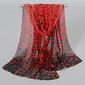 Lightweight chiffon scarf with vintage red polka dot print on black background