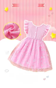 Detail of pink girls tulle dress featuring silver sequin butterflies and flutter sleeves
