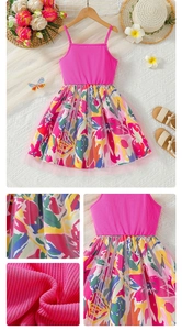 Detail view of pink ribbed knit bodice and colorful graffiti floral skirt with mesh layer