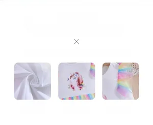 Detail of girls white cotton dress featuring unicorn print and rainbow mesh shoulder ruffles