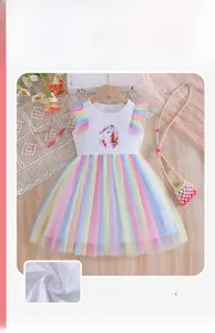 Detail of girls' unicorn dress with rainbow tulle skirt and flutter sleeves on cotton top