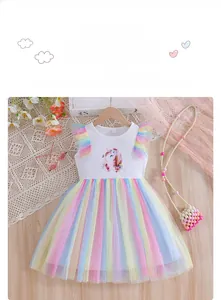 Detail of girls unicorn rainbow mesh dress with colorful tulle layers and flutter sleeves