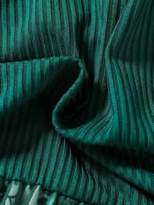 Girls dark teal ribbed dress with delicate lace hem detail and fly sleeves for summer