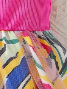 Girls summer two-piece outfit with pink ribbed top and colorful floral mesh skirt set