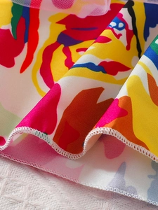 Girls summer two-piece outfit with colorful floral abstract print and tulle hem detail