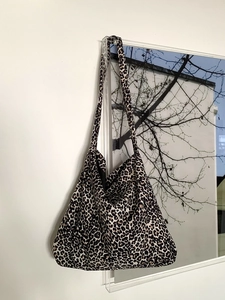 Large capacity leopard print corduroy tote bag for women showing stylish trapezoid shape