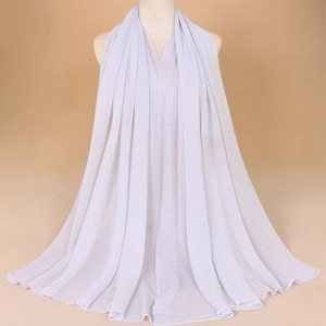 Light grey pleated shawl made of breathable nylon fabric with fine gold thread texture