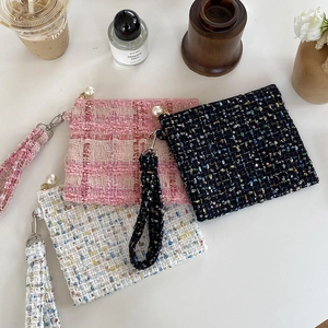 Drie elegante tweed cosmetische tasjes met parelrits en afneembare polsbandjes