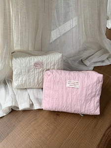 Large pleated nylon cosmetic travel organizer bags in cream white and light pink colors
