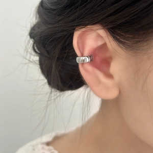 Minimalist silver ear bone cuff with textured vertical stripes for non-pierced ears