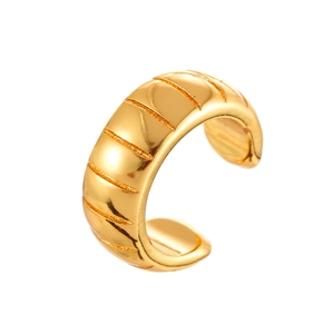 Elegant gold ear cuff with grooved bamboo texture in a minimalist polished finish