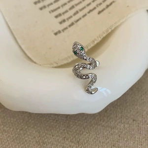 Elegant silver snake ear cuff with white cubic zirconia and green gemstone eyes for women