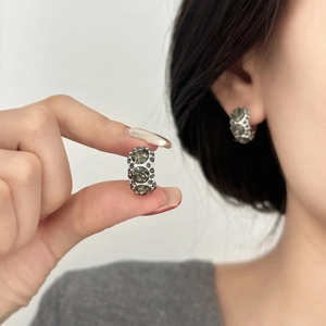Retro silver wide stud earrings featuring large grey zircons and micro-pave crystals