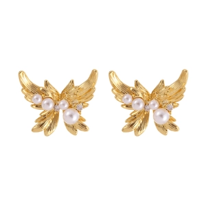 Elegant gold butterfly earrings with white pearls and sparkling diamond accents for women
