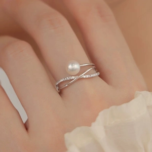 Elegant multi-layer silver ring with white pearl and sparkling zircon stones