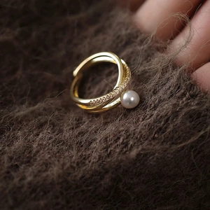 Elegant gold double-layered open ring with cubic zirconia and a round white pearl inlay