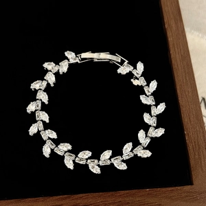Elegant silver-tone laurel leaf bracelet with sparkling marquise-cut cubic zirconia crystals