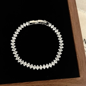 Elegant marquise cut zircon bracelet in silver finish on a black velvet jewelry box