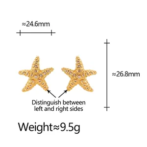 Boucles d'oreilles étoile de mer dorées avec strass blancs et dimensions précises