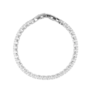 Macro shot of silver tennis bracelet with square-cut cubic zirconia and fold-over clasp