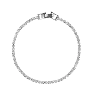 Macro shot of silver tennis bracelet featuring cubic zirconia and secure safety clasp