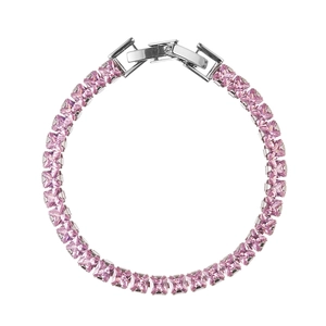 Macro view of a silver tennis bracelet featuring square-cut pink cubic zirconia stones