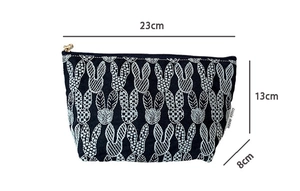 Detailed size specifications of black canvas rabbit embroidery makeup bag 23x13x8cm