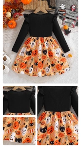 Detail of Halloween toddler dress featuring pumpkin print skirt and black ribbed bodice