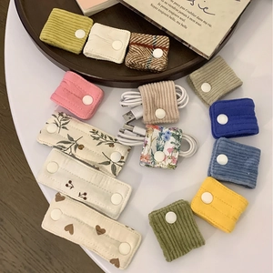 Corduroy and cotton fabric cable organizers with snap buttons in assorted colors