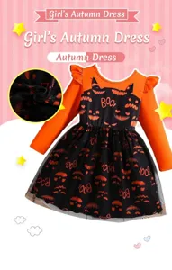 Détail d'une robe d'Halloween pour fille avec volants, jupe en tulle et lettrage BOO