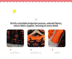 Détail de la robe Halloween pour bébé avec lettrage Boo et motifs de citrouilles