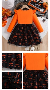Detail of baby girl Halloween dress with orange flutter sleeves and pumpkin print tulle
