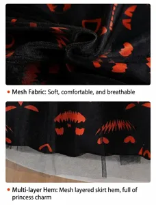 Détail du tissu en maille noire avec imprimé monstre orange pour robe Halloween enfant