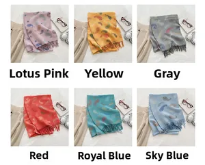Detail view of paisley knit scarves in six colors with soft fringe and star patterns