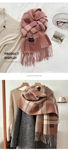 Detailed view of lilac plaid imitation cashmere scarf with tassels and elegant label