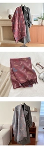 Detail of paisley pattern and tassels on premium cashmere-feel pashmina shawl