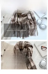 Detailed view of soft cashmere-feel checkered scarf with fringe tassels and warm texture