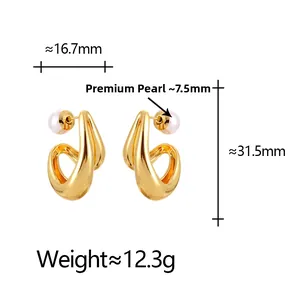 Detail view of gold irregular hoop earrings with 7.5mm pearl and precise dimensions