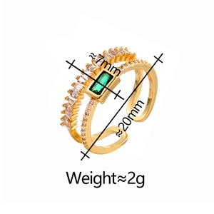 Minimalist double layer gold ring featuring a green zircon stone and adjustable open band