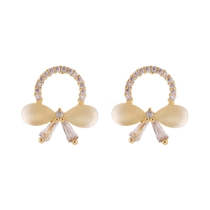 Elegant gold bow earrings featuring cat eye stone and cubic zirconia in a circular design