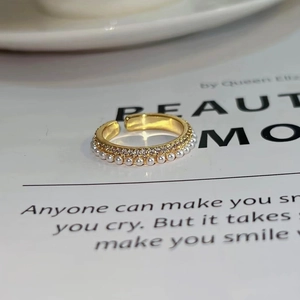 Elegant gold plated open ring featuring double rows of white pearls and zircon stones