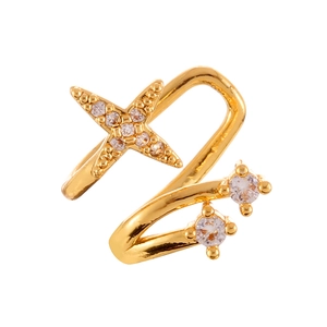 Minimalist gold ear cuff featuring star motif and cubic zirconia accents on white background