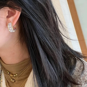 Lace hollow C-shaped hoop earrings with zircon accents and mixed gold-silver plating