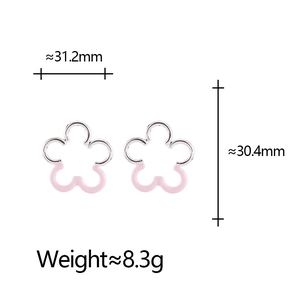 Detail showing pink flower stud earrings with 31.2mm width and 30.4mm height dimensions