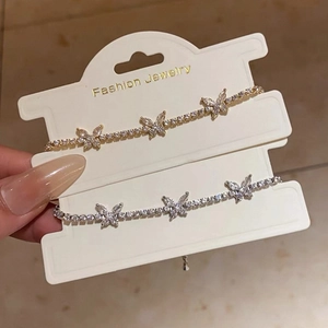 Elegant gold and silver butterfly bracelets with sparkling cubic zirconia stones for women