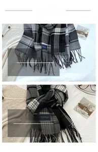 Macro detail of classic plaid scarf featuring soft fringe and high-density woven texture