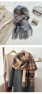 Detail of plaid scarves featuring elegant classic labels and soft tassel fringe edges
