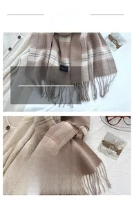 Detailed close-up of brown and beige plaid scarf showing soft texture and hand-twisted tassels