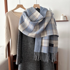Classic blue and white checkered scarf with soft fringe and elegant vintage style